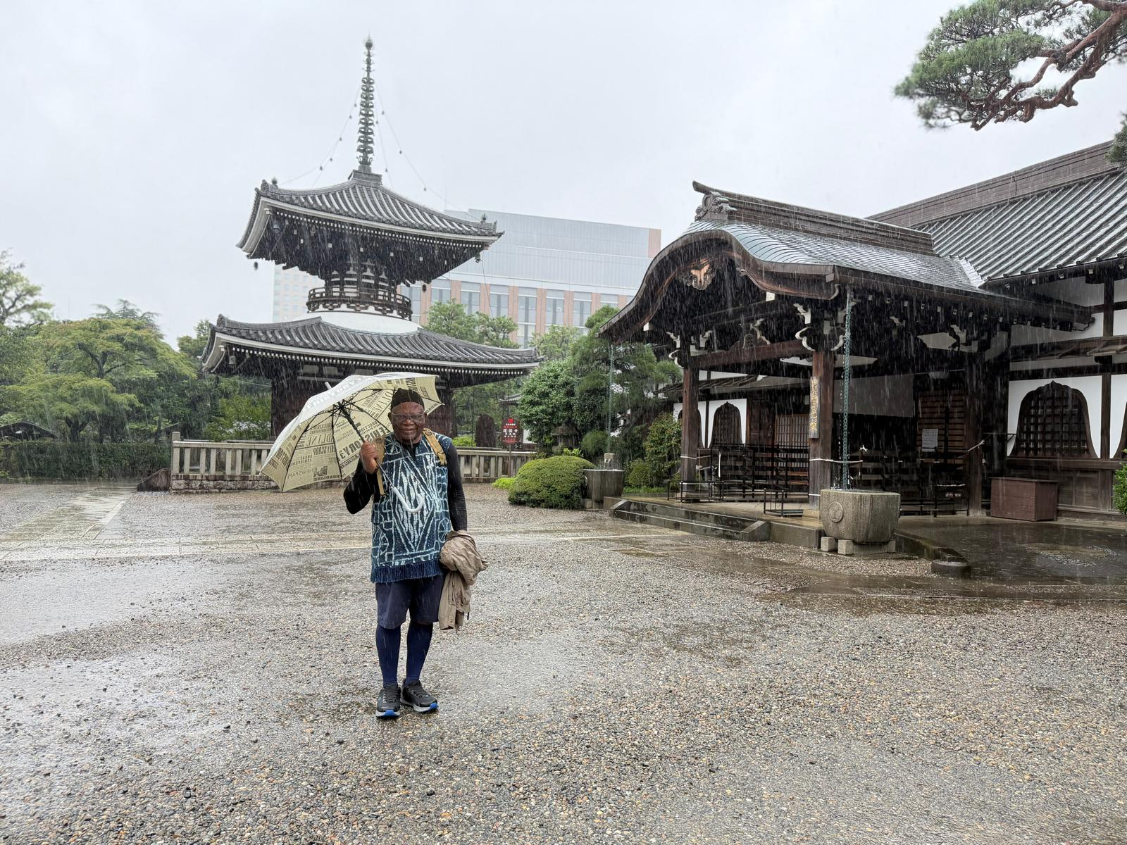 Pa Fru at a temple in the rain