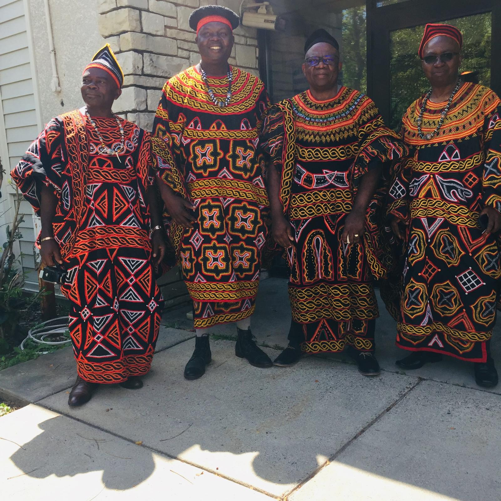 Four notables in embroidered toghu regalia